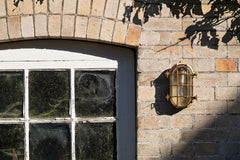 Flaxman Lacquered Brass IP66 Bulkhead Outdoor & Bathroom Wall Light - SE Home